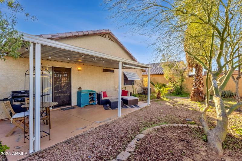 Backyard w/ covered patio