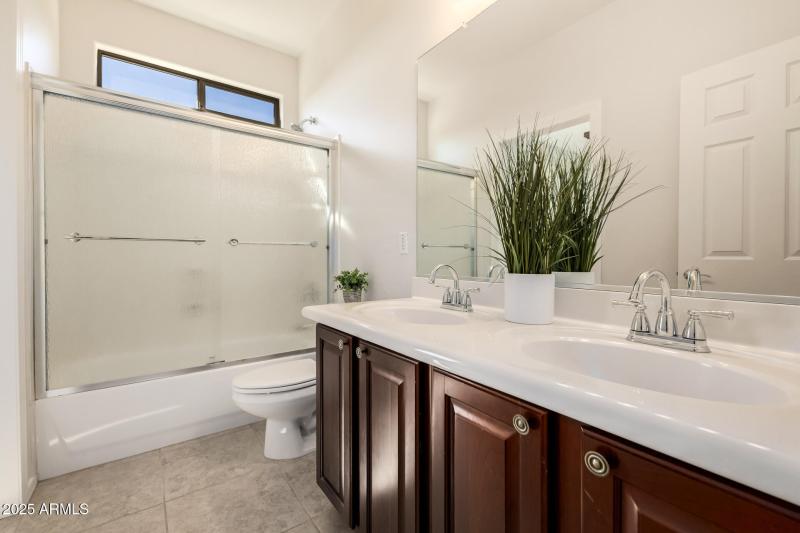 34 Upstairs Guest Bath J&J with 2 entran