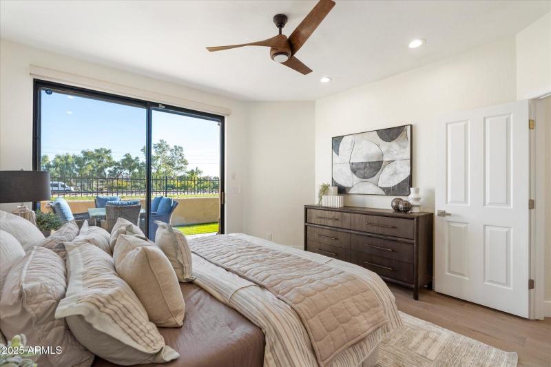 Primary Suite with sliders to patio