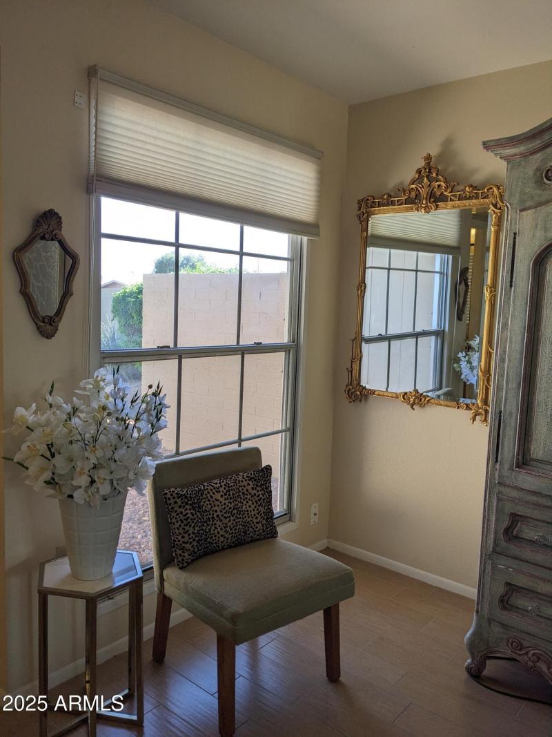 PIRMARY BEDRROM WITH VIEW OF FRONT COURT