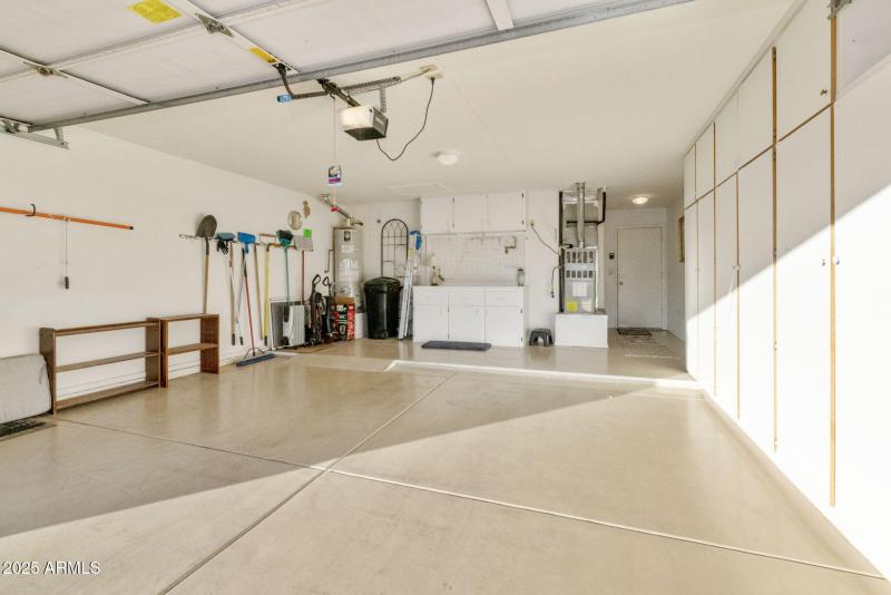 Garage with cabinets/work bench