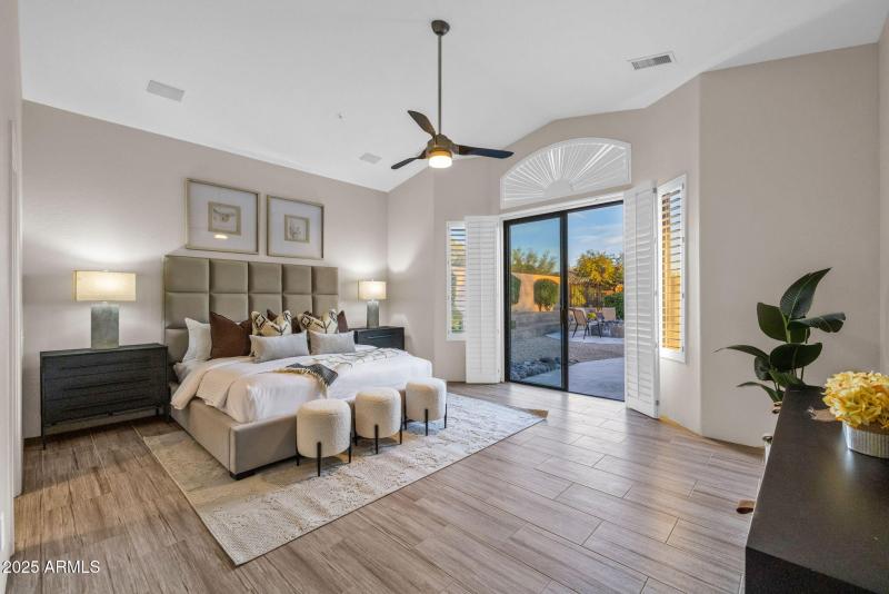 PRIMARY BEDROOM WITH EXIT TO BACKYARD