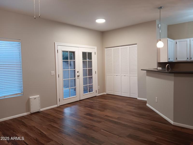 Double doors to covered patio and garage