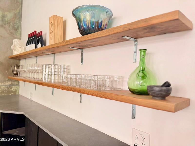 Display shelving above serving station