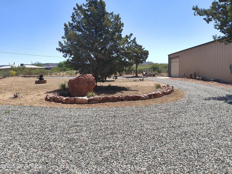 circular drive & shop building