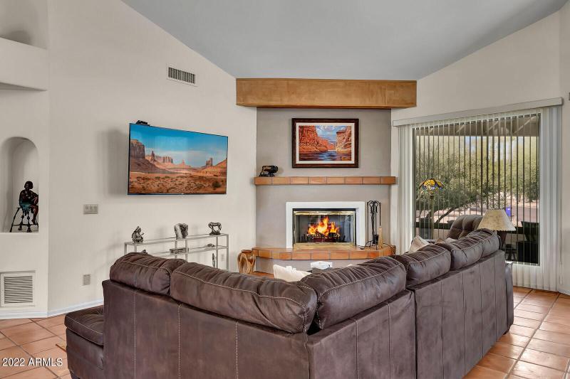 Living Room with Fireplace and TV