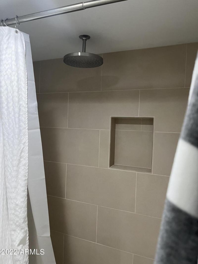 Rain shower head in bathroom