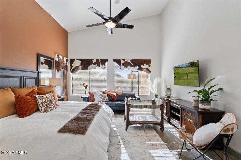 Large Primary Bedroom with TV