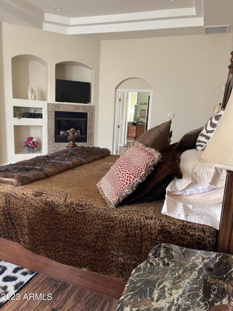 MASTER B/R VIEW OF TV & BATH