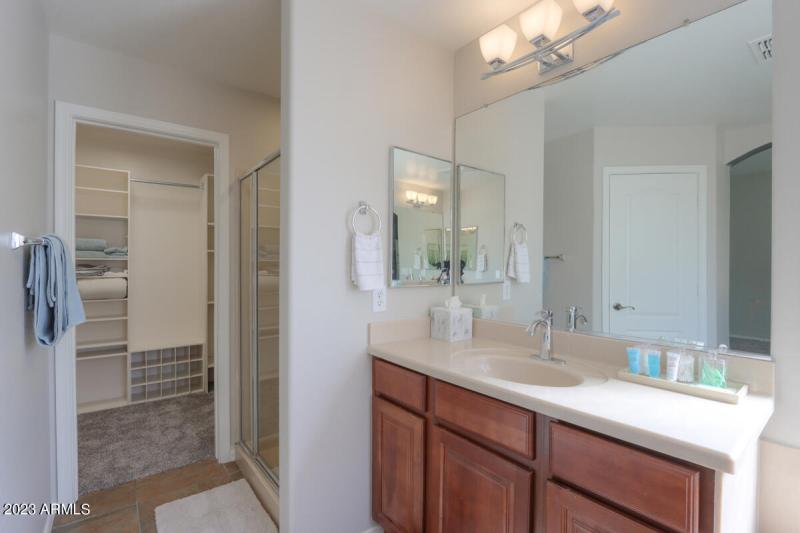 24 Owners suite sink photo with Shower