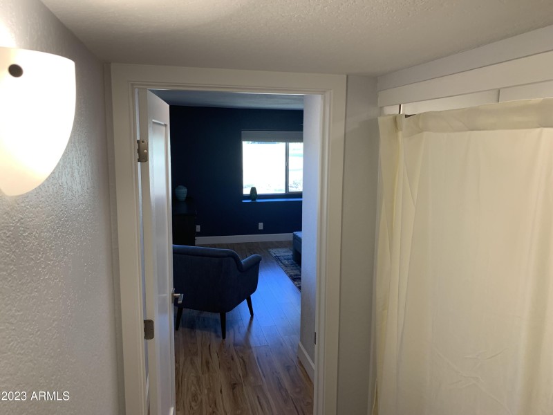 Hallway to private Primary BR