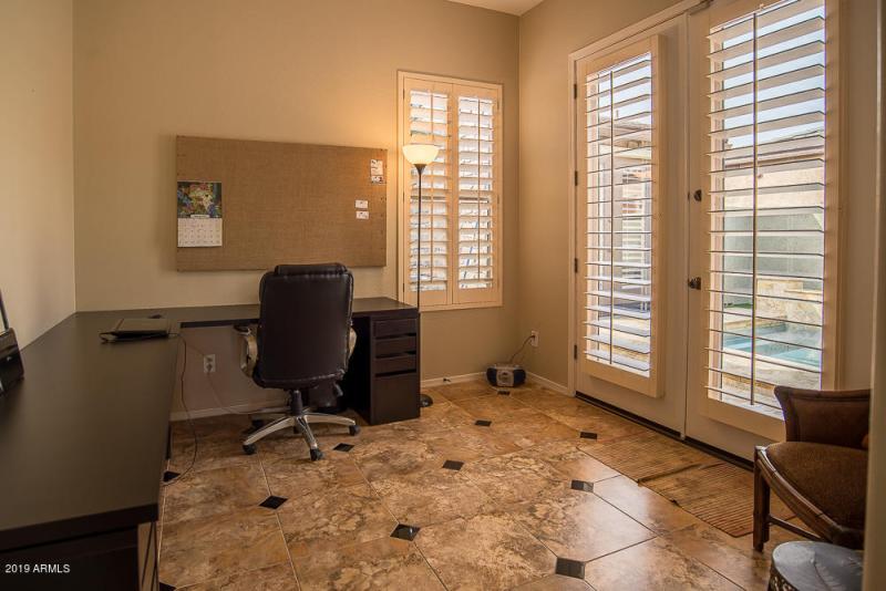 Den with Doors to Courtyard