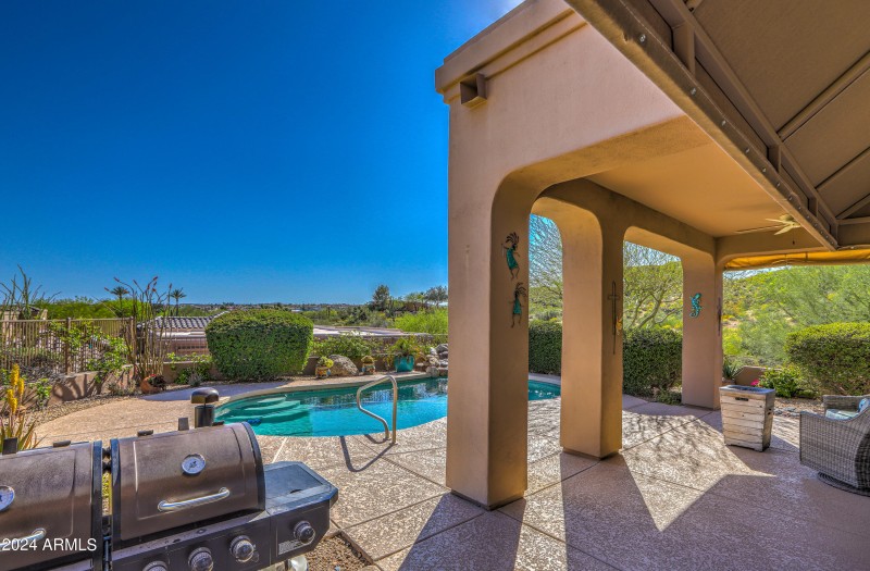 Covered patio in front pool area