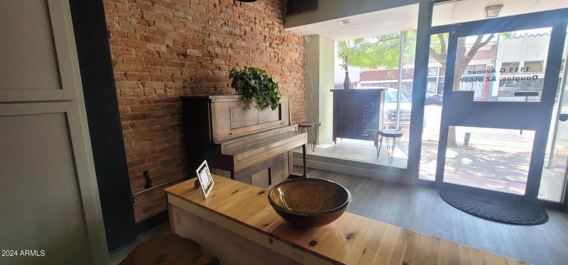 1113 G Ave brick wall and glass window