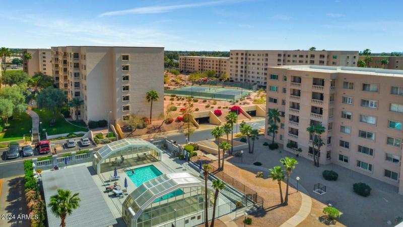 Ariel of Covered Pool + Courts