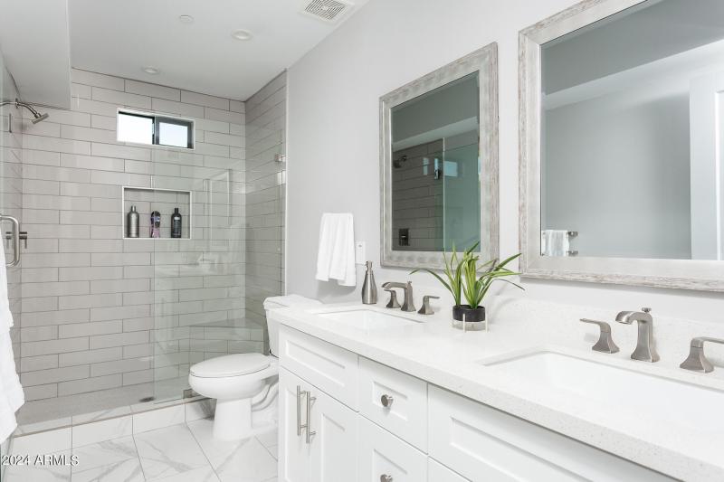 Bathroom-Dual-Vanity-Sinks-and-Walk-In-S