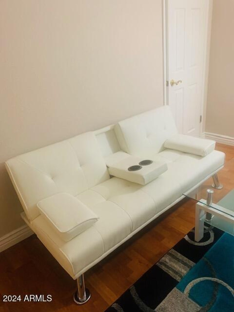 Leather couch in 2nd bedroom
