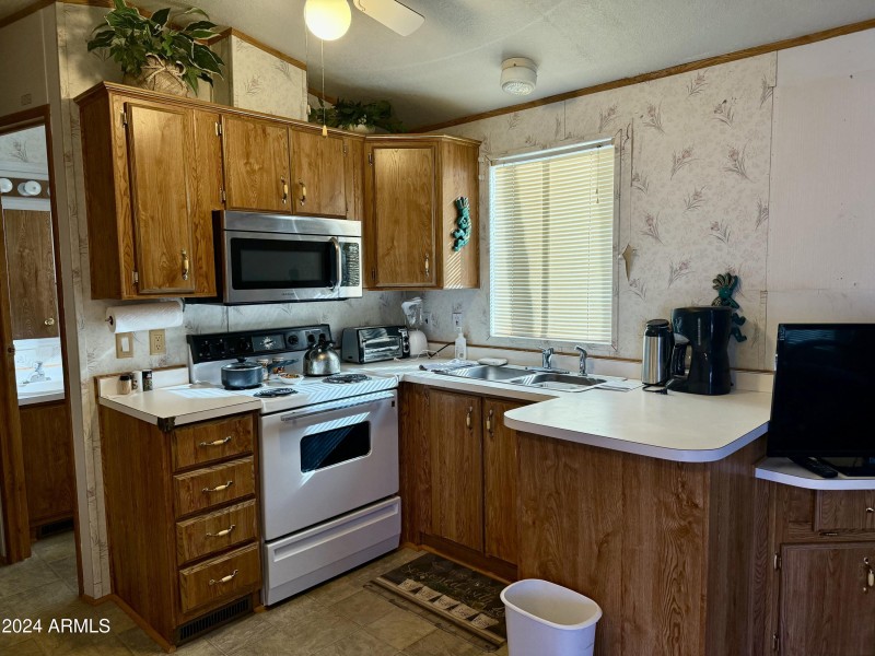 7750 E. Broadway Rd. #149