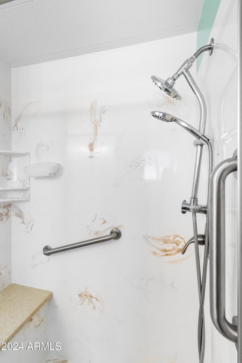 Primary Shower with Bench and Grab Bars