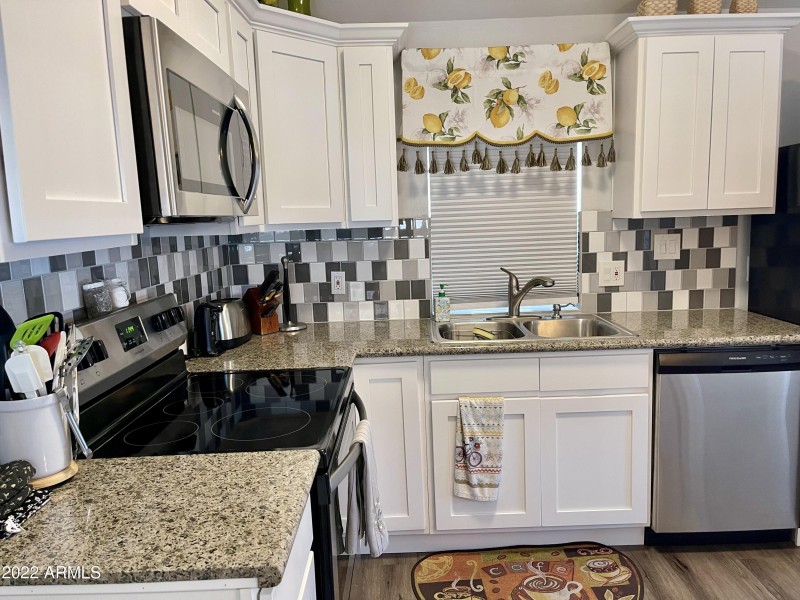 7750 E. Broadway Rd. #911