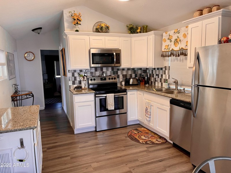 7750 E. Broadway Rd. #911