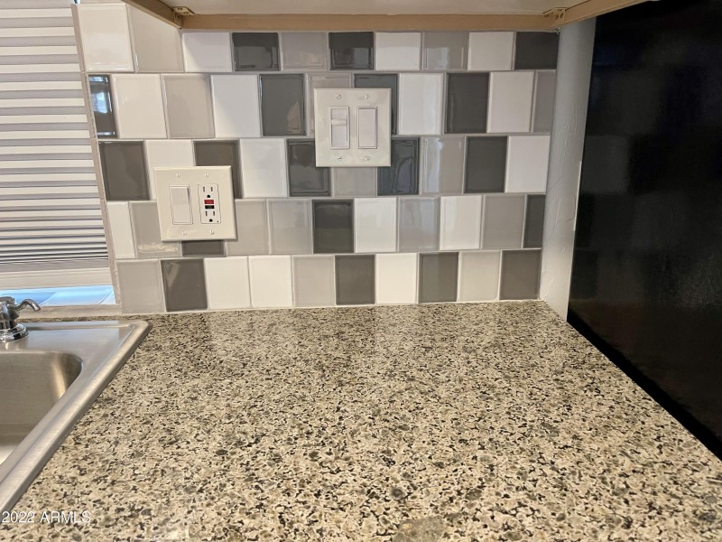 7750 E. Broadway Rd. #911