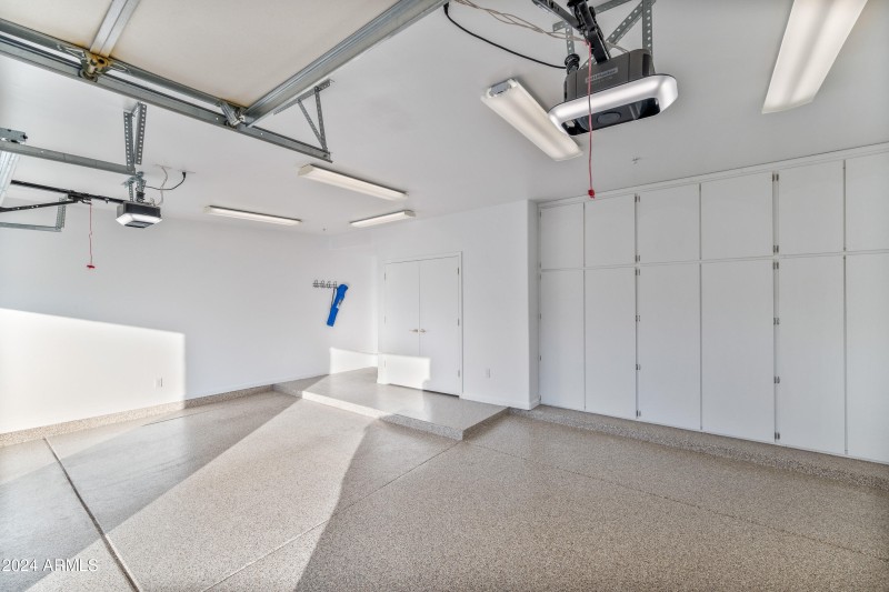 Garage with Spacious Cabinets