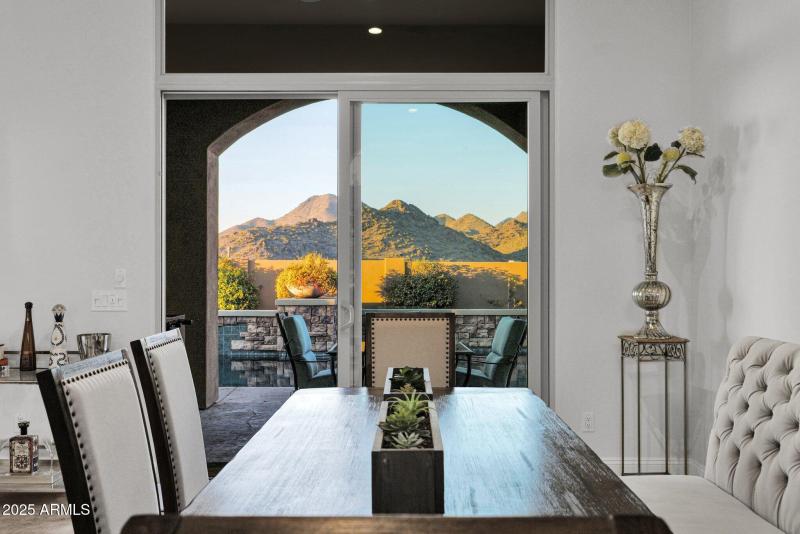 Formal dining with mountain views