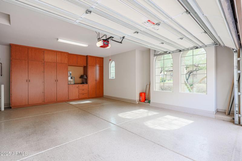 2 Car Garage With Built in Cabinets