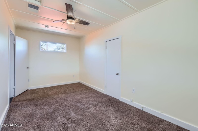 Guest House Bedroom with view of closet