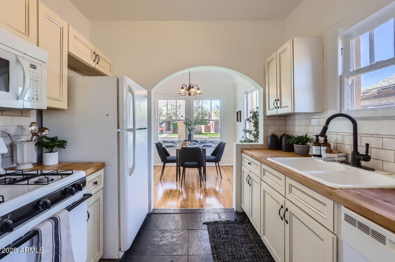 Galley kitchen view form laundry room