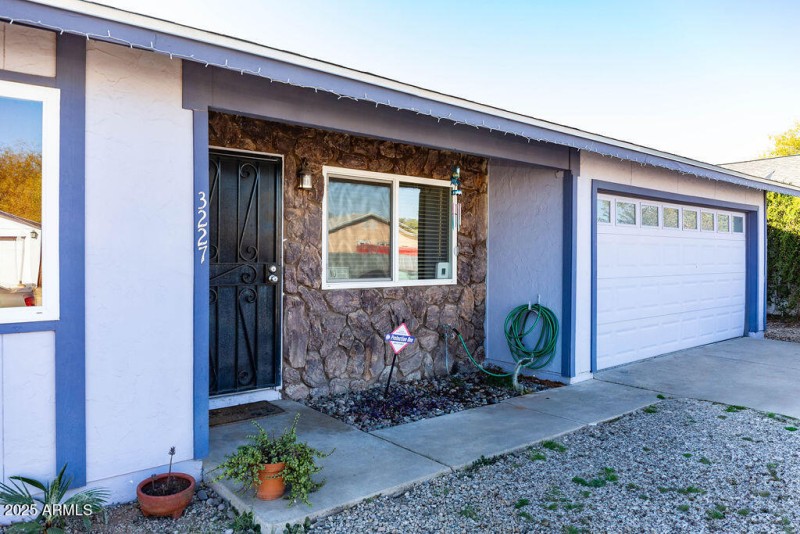 Front Door & 2 Car Garage