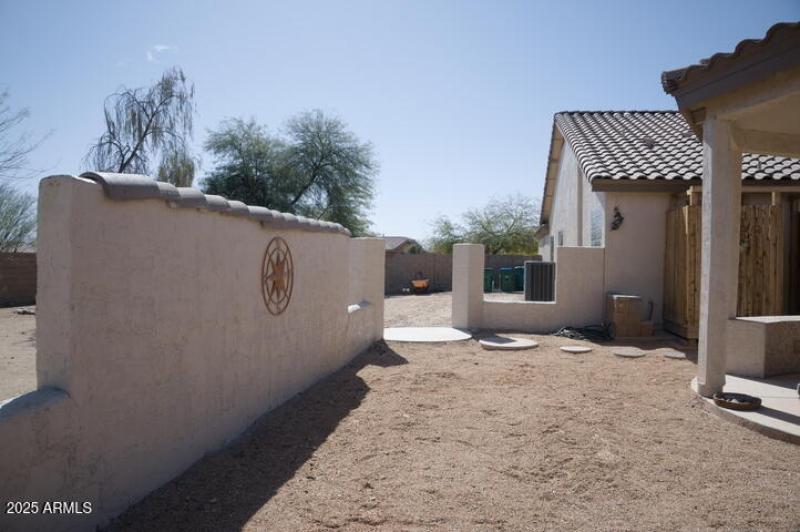 Backyard facing West From South side Bri