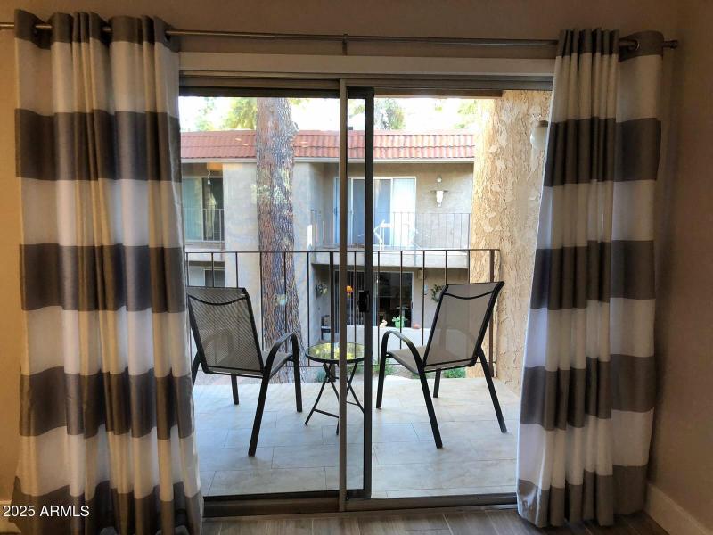 Covered Balcony w/ Pool View