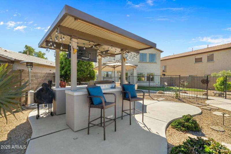 OUTSIDE KITCHEN PLENTY OF SEATING