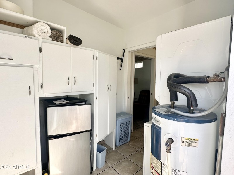 SMALL FRIDGE AND 2ND LARGE WATER HEATER
