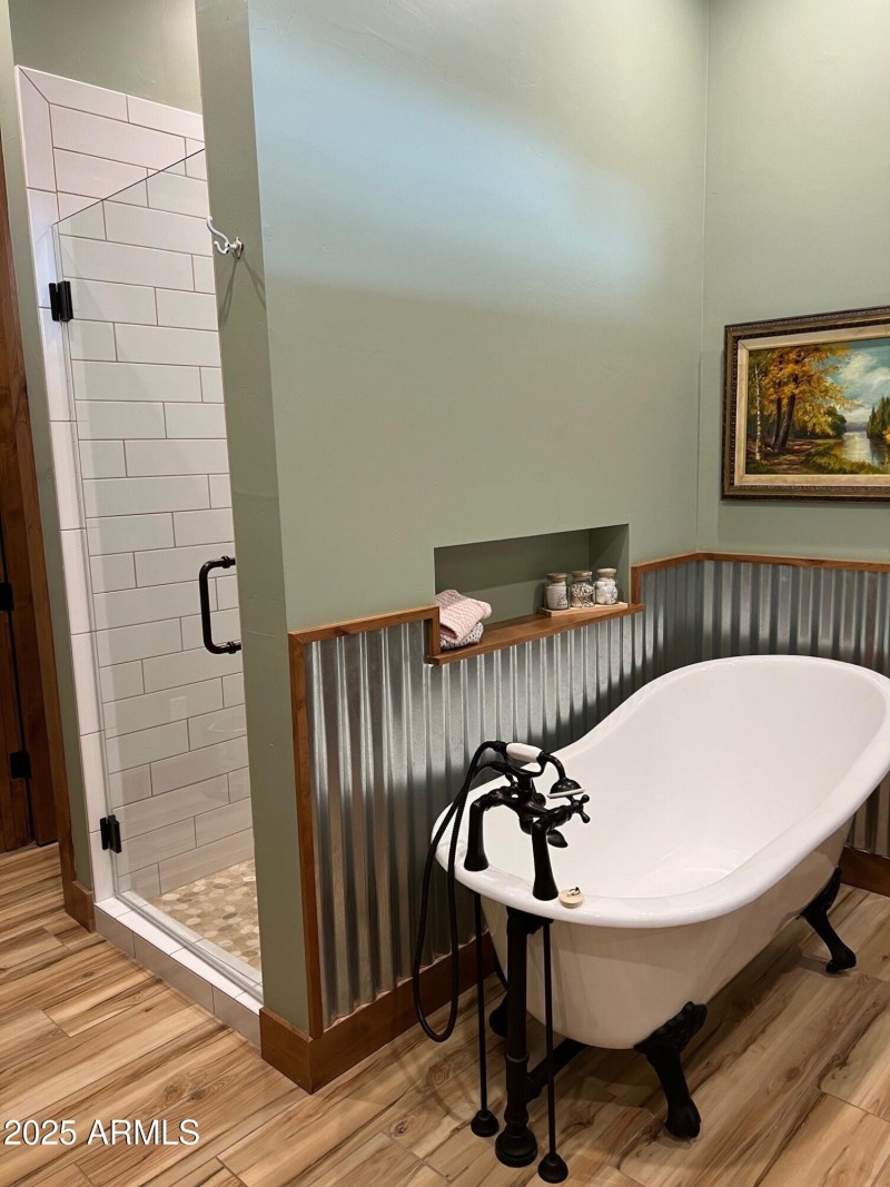 Shower to tub location