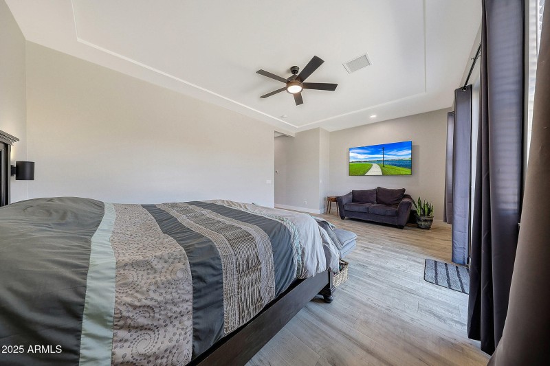 Tray ceiling in primary bedroom