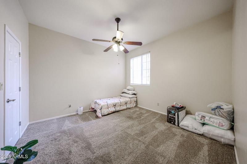 Bedroom 2 downstairs with walk in closet