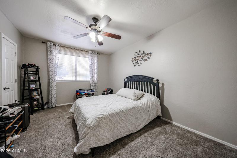 Bedroom 3 downstairs with walk in closet