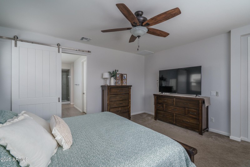 12) PRIMARY BEDROOM