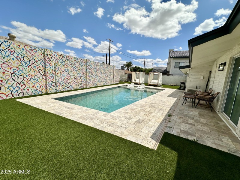 Stunning backyard with tall fence!