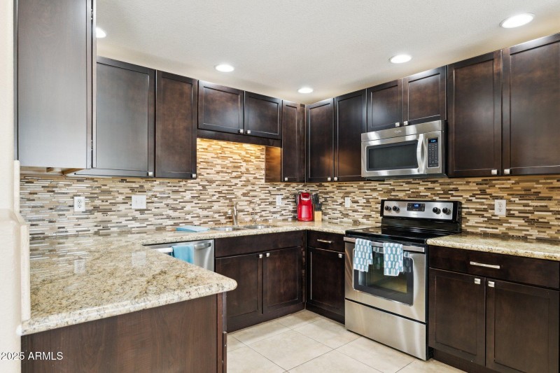 8-web-or-mls-9555-e-raintree-dr-unit-206