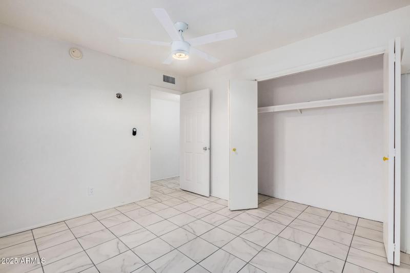 Light-Filled Bedroom With Closet