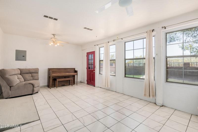 Sunroom With Red Door Access