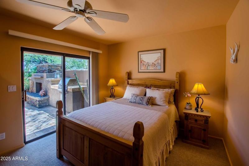 guest bedroom with patio entrance