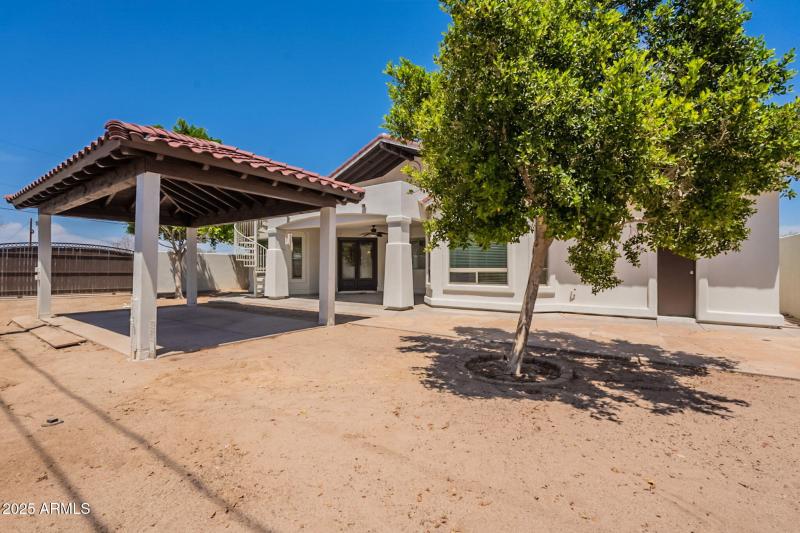 Yard area with outside full bathroom