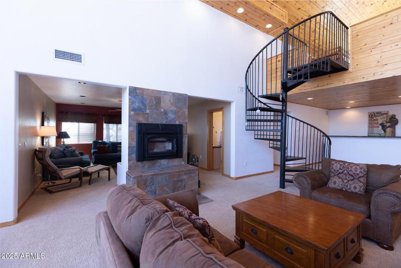 Stone Fireplace and Spriral Stairs