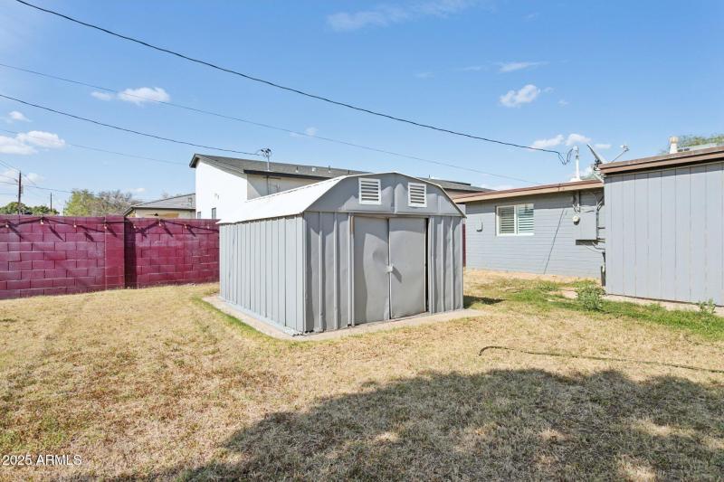 Storage shed included