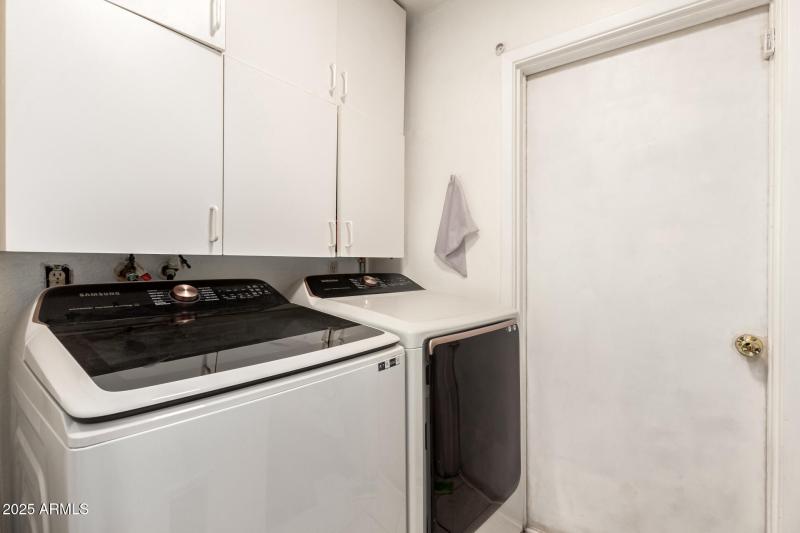 Laundry with cabinets